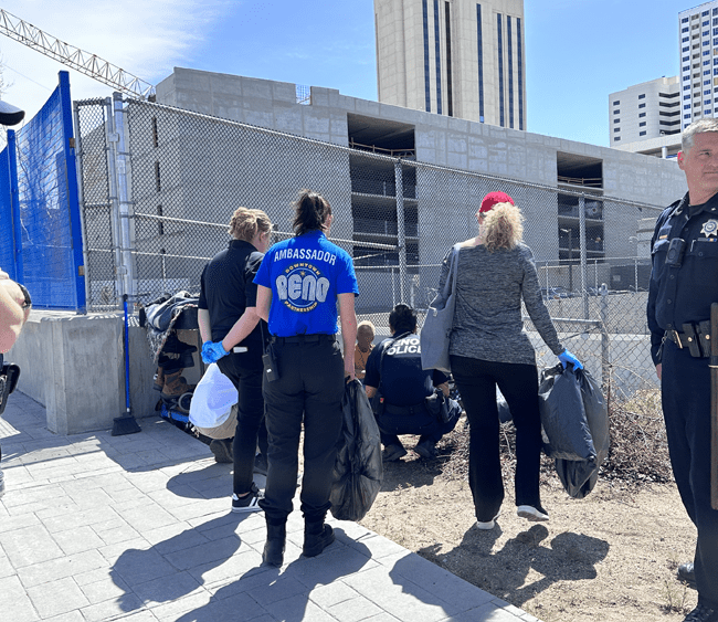 Ambassadors and Reno police responding to a homeless person in need.