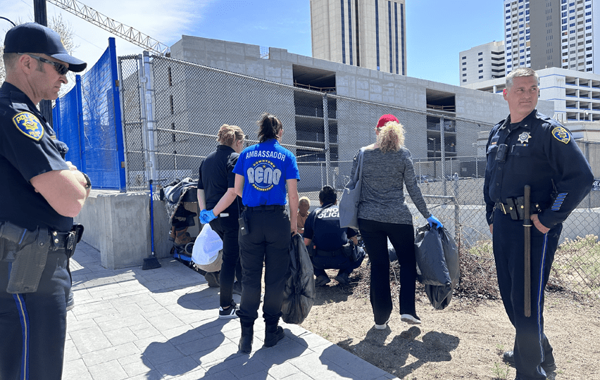 Ambassadors and Reno police responding to a homeless person in need.