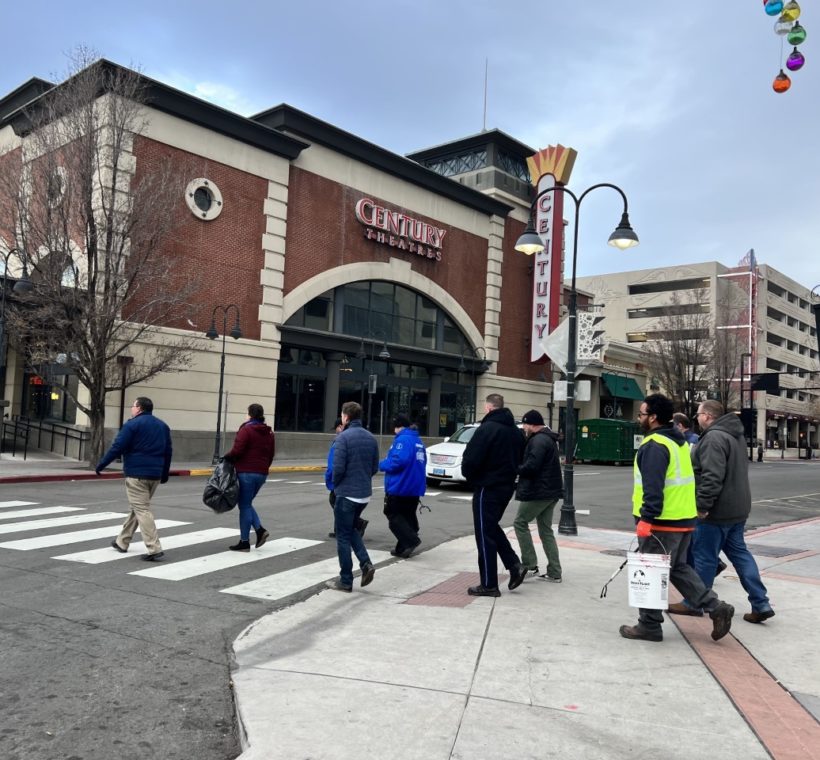 Ambassadors walking around Downtown Reno. They are crossing Sierra Street infront of the Century Movie Theaters.